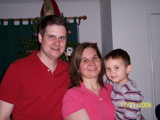 Christmas 2006: Ryan Davis, wife Julie, and son Joel 